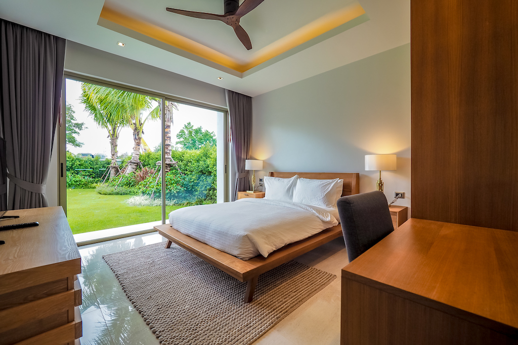 Fourth bedroom opening onto the tropical garden