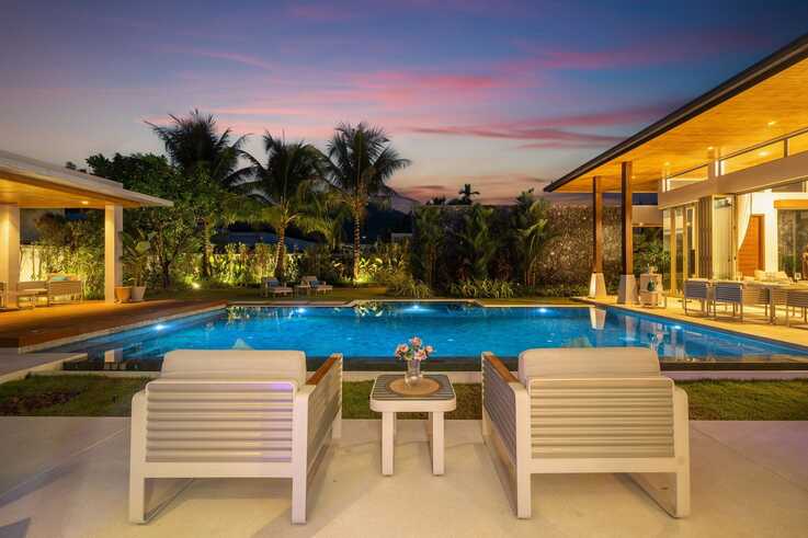 Poolside loungers at sunset