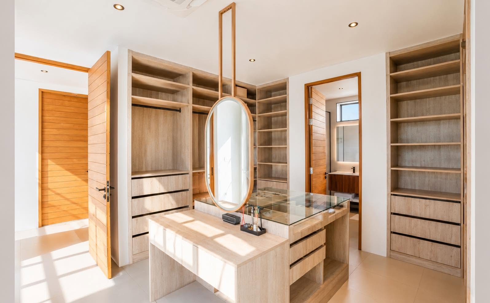 Walk-in wardrobe and dressing room with timber joinery