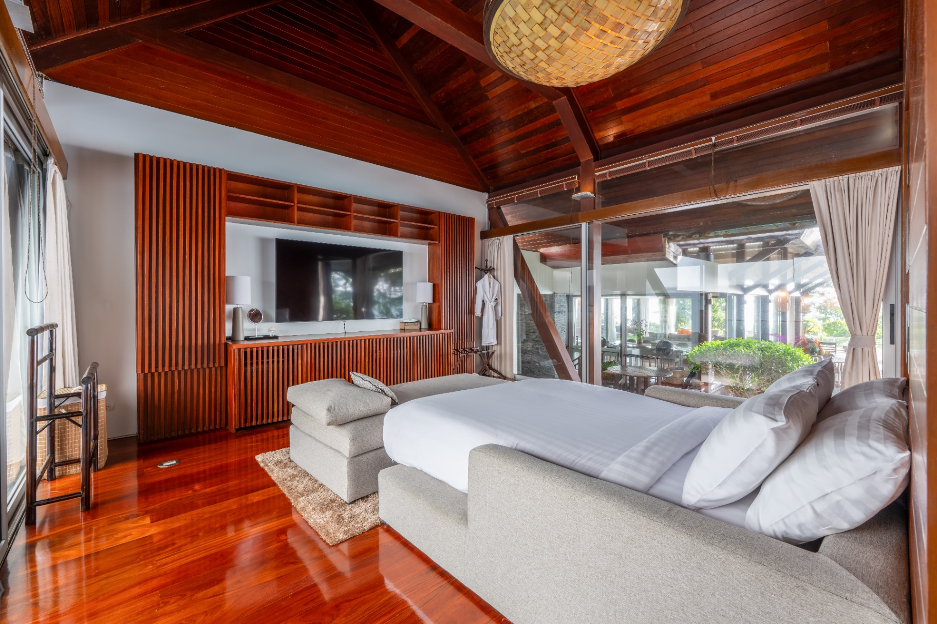Master bedroom with teak suite and smart TV