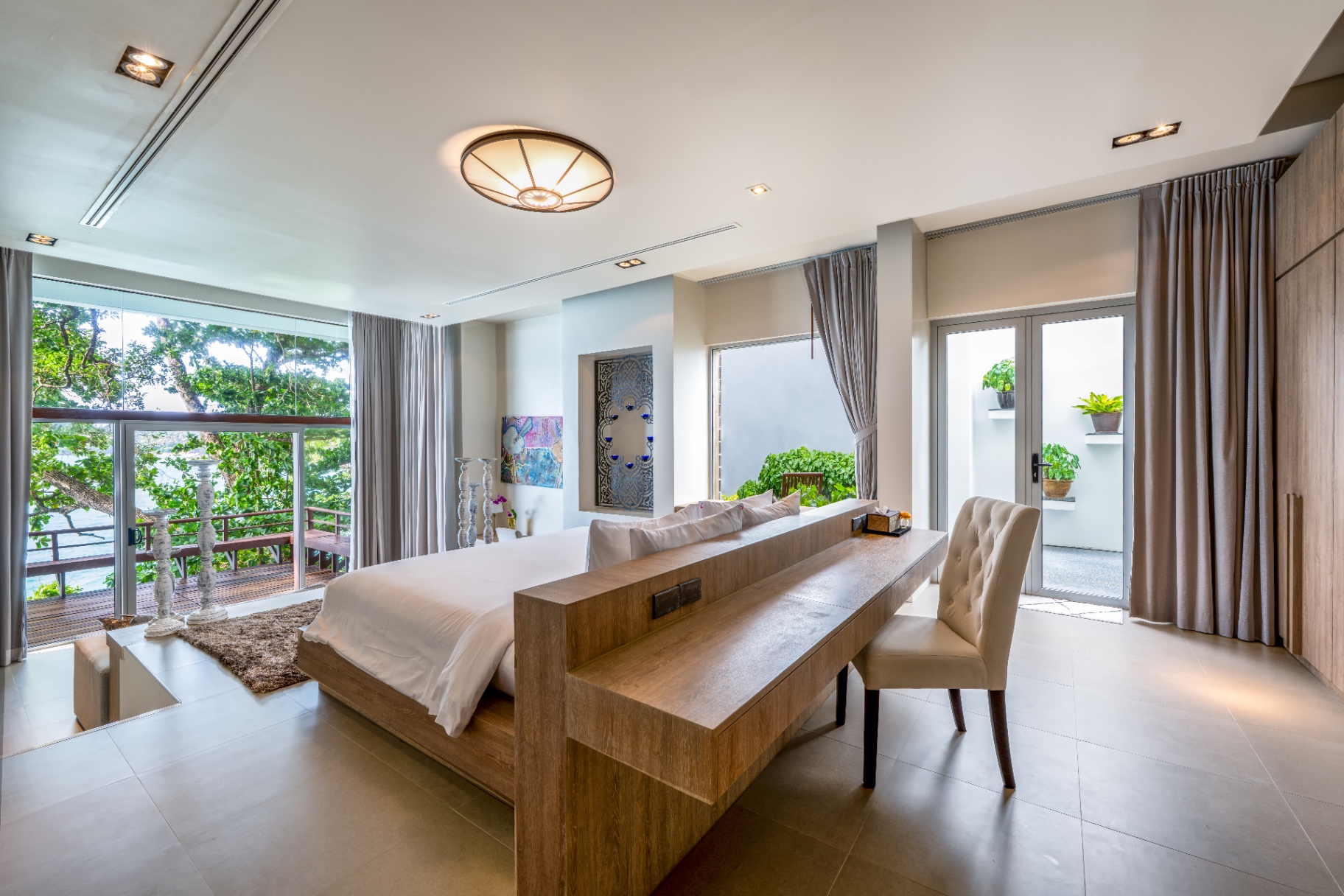 Ocean-view bedroom with private balcony