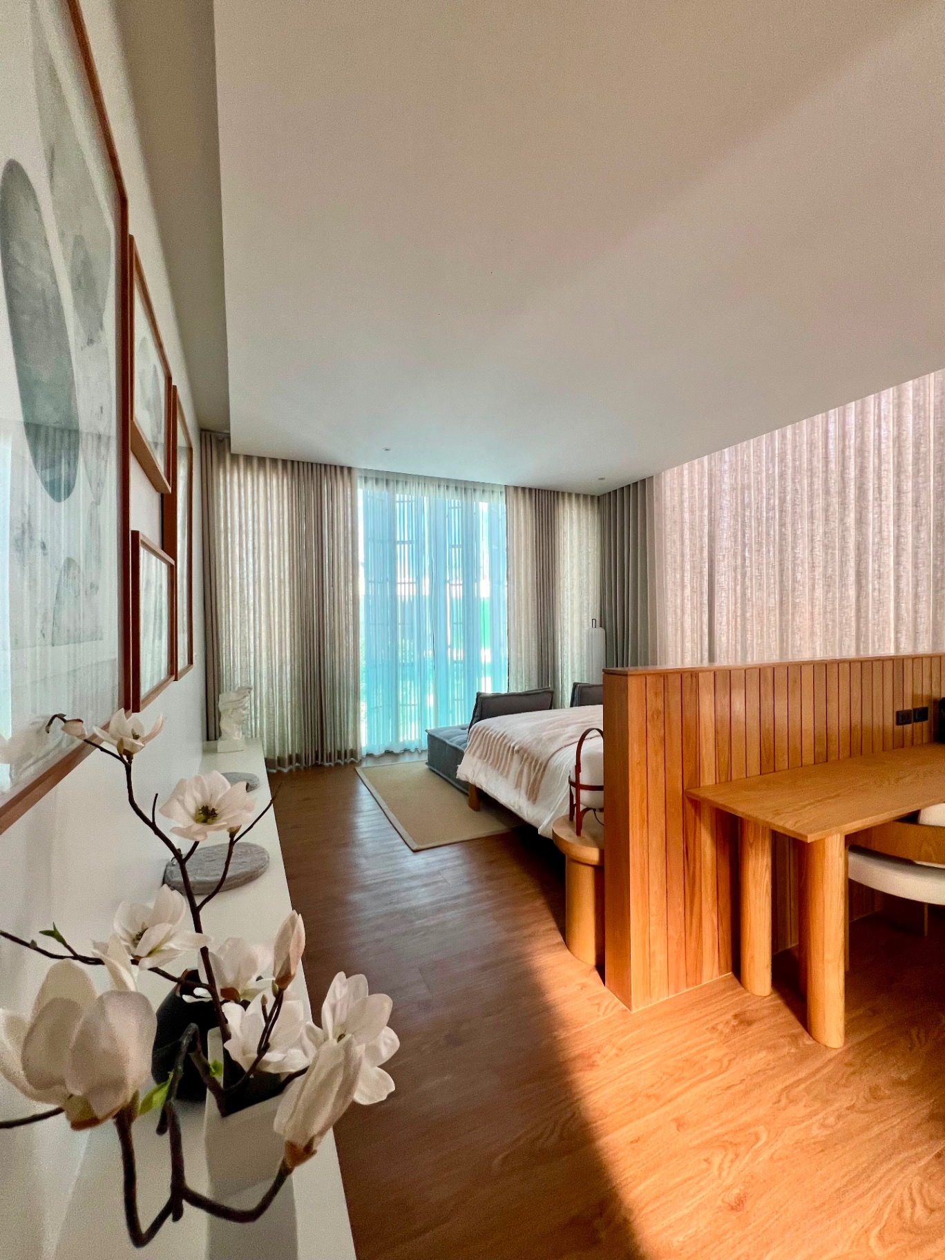 Bedroom suite with timber screen, desk nook and soft natural light