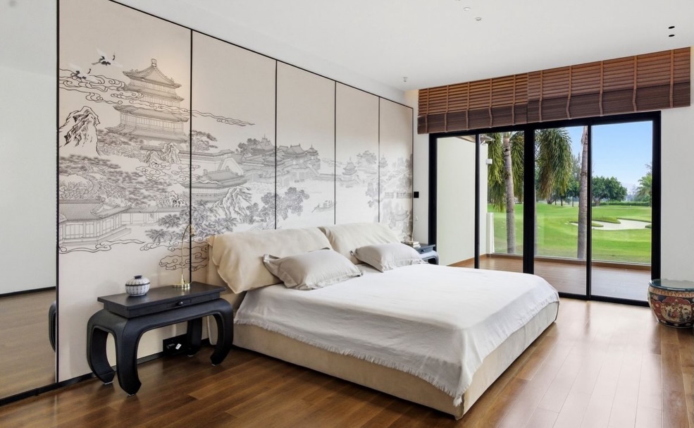 Bedroom suite with mural wall and direct fairway view