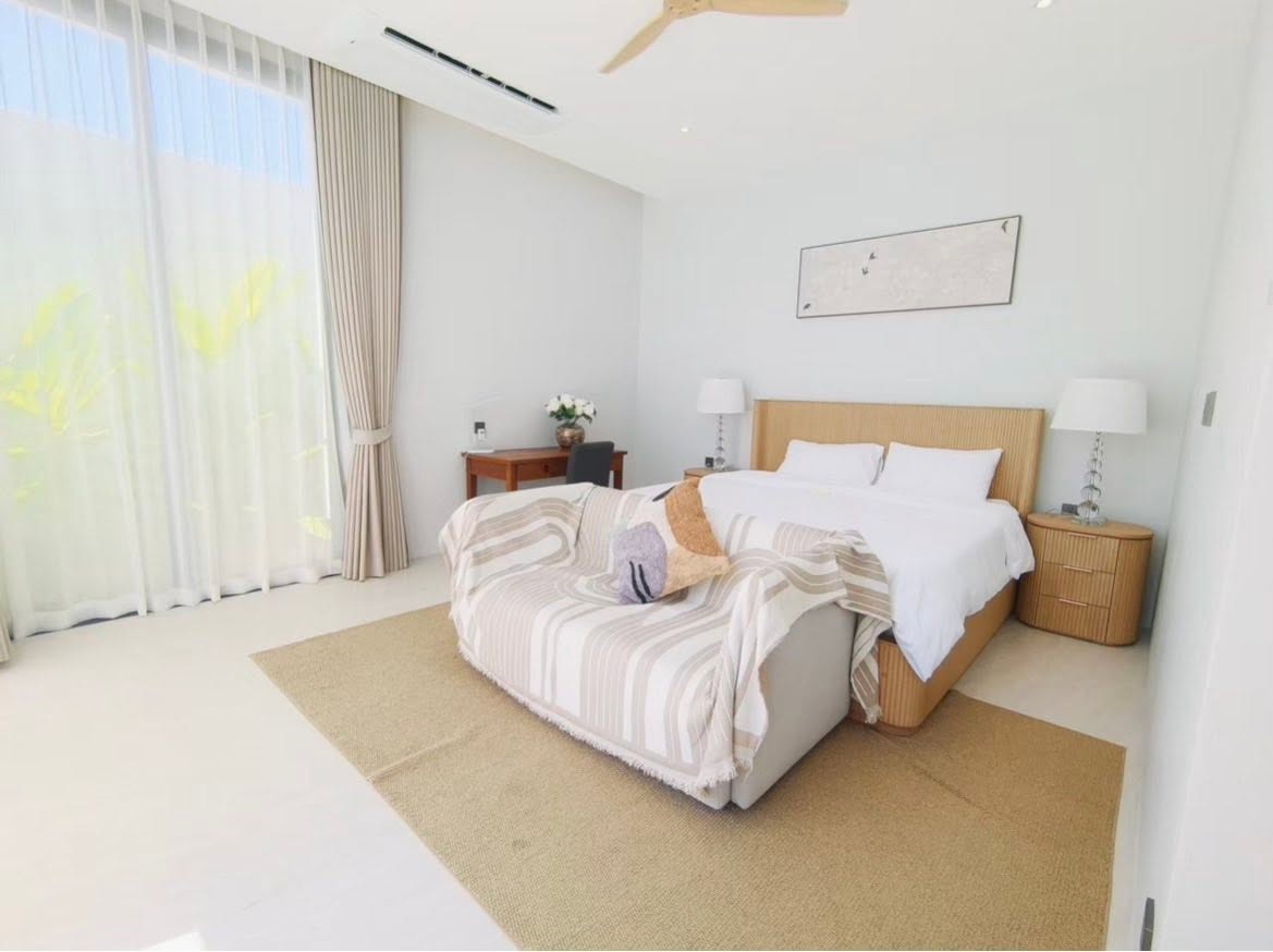 Spacious master bedroom with garden outlook