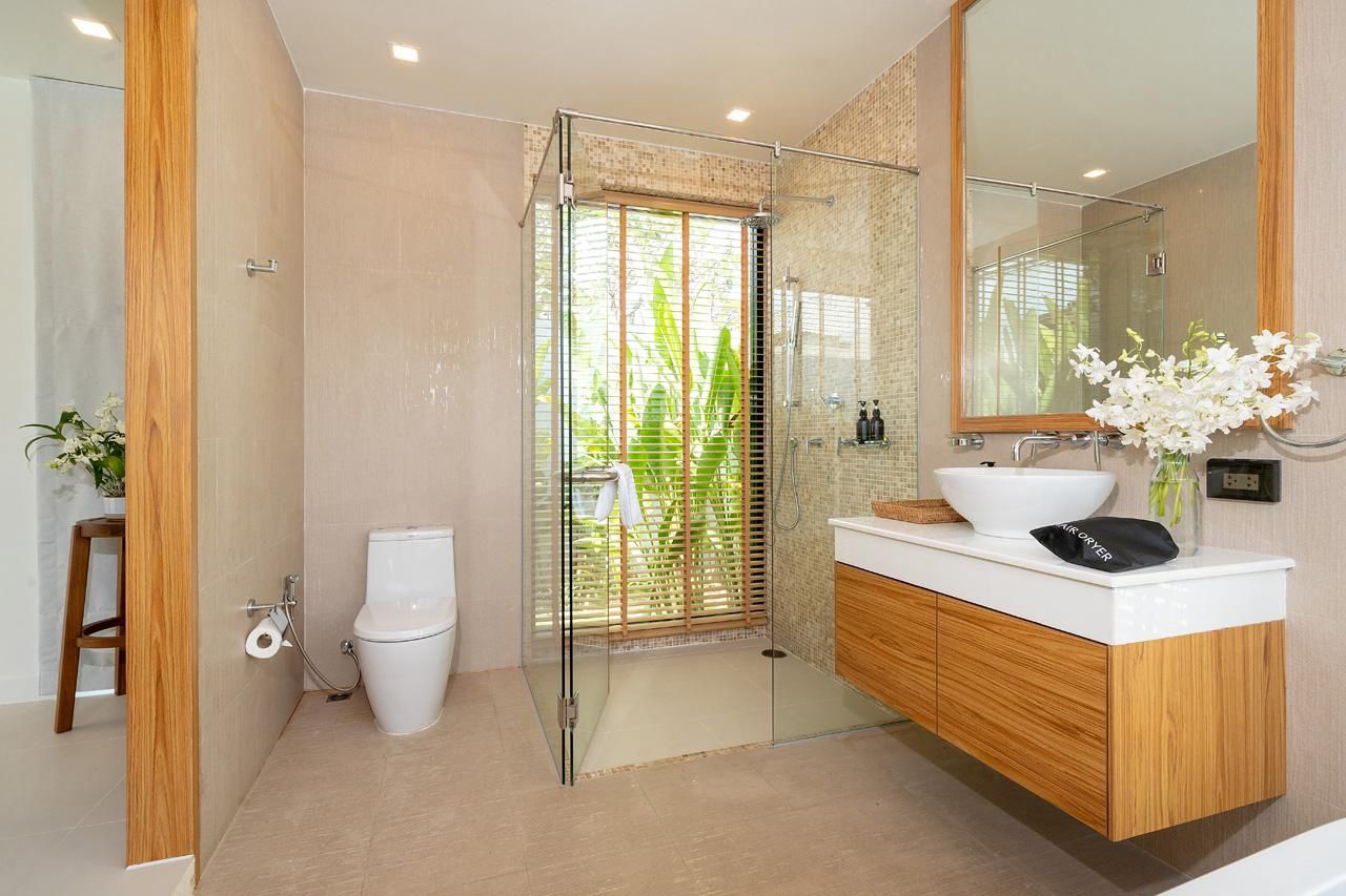 Guest bathroom with walk-in rain shower and timber vanity