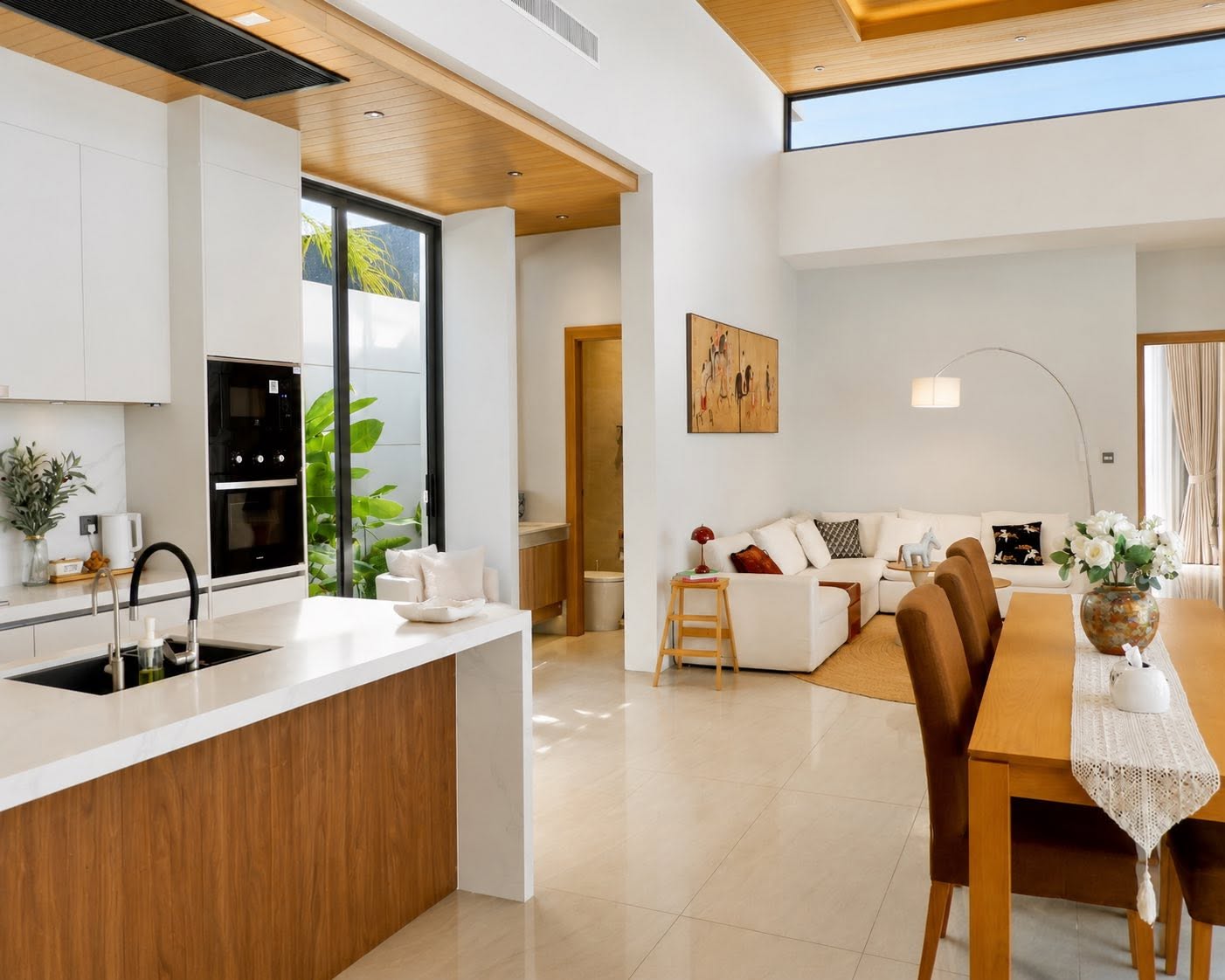 Open-plan kitchen flowing into the living space