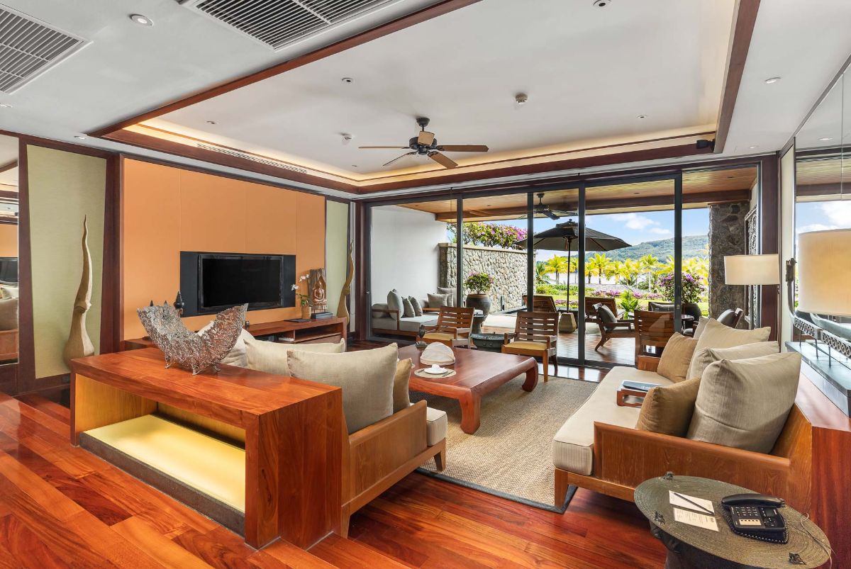 Living room opening to terrace with sea views