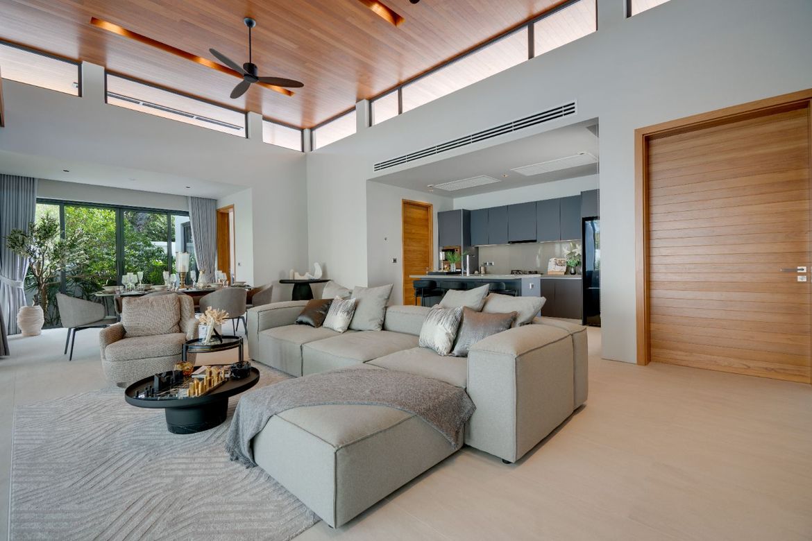 Contemporary living room with high ceilings and natural light