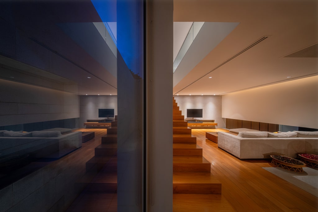 Split-level living room at night