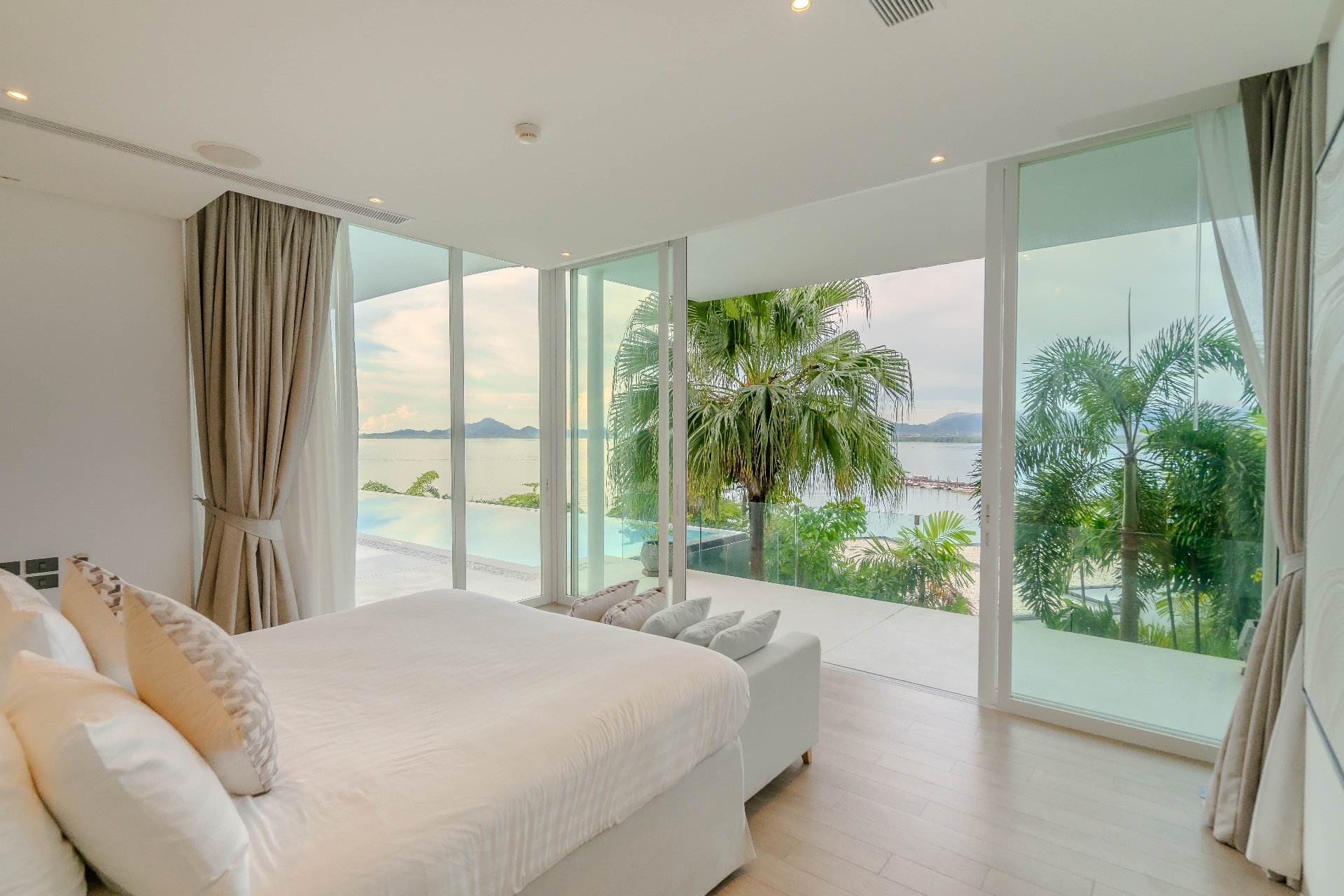 Master bedroom with pool and ocean views