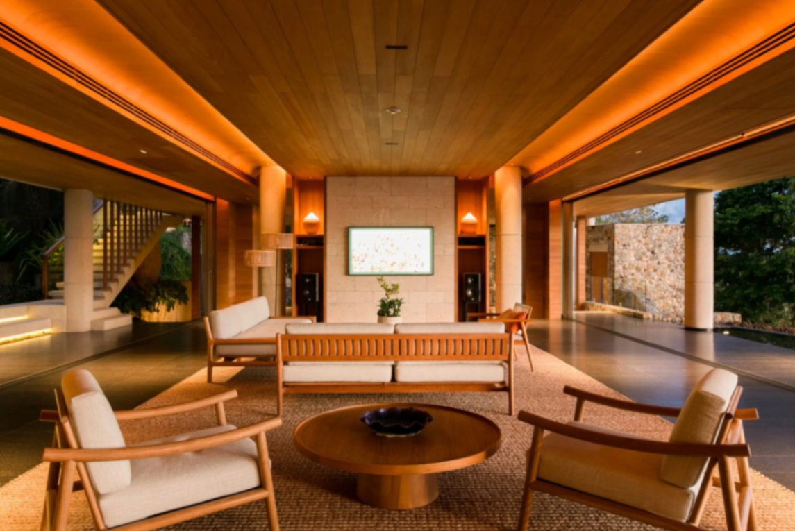 Living pavilion lounge with warm evening lighting