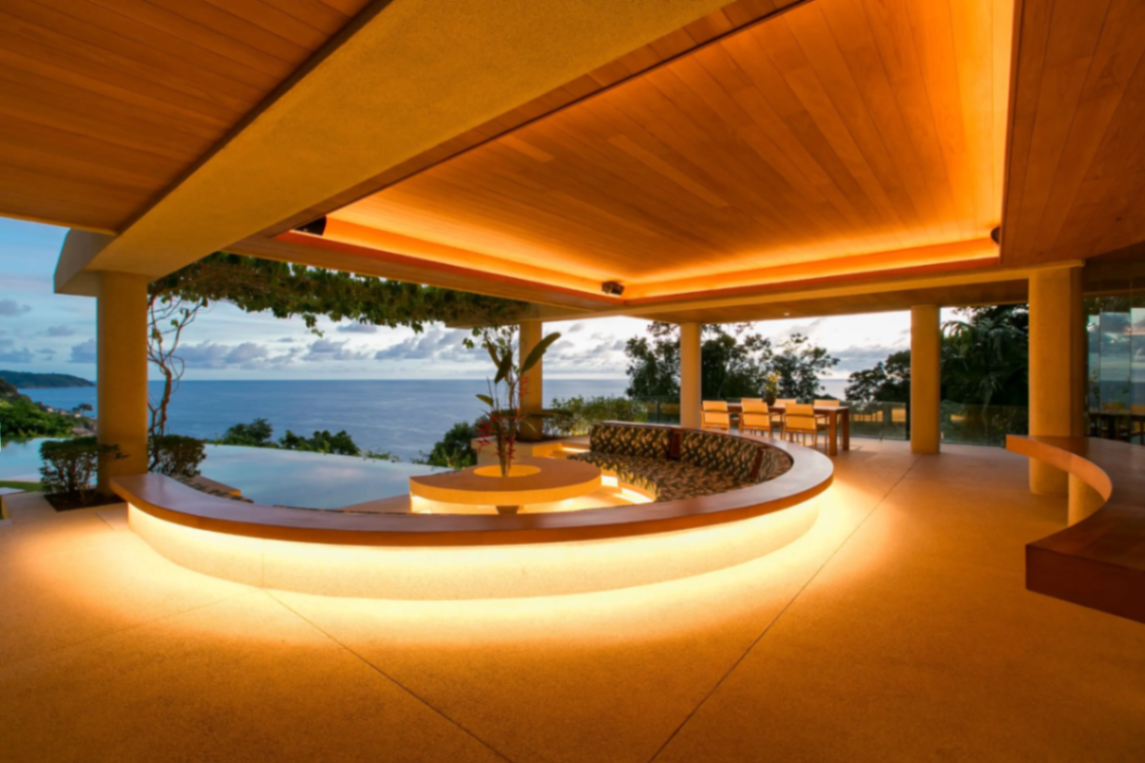 Sunken lounge with panoramic ocean view at sunset