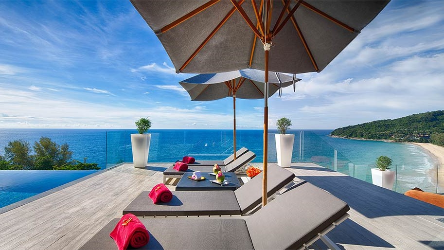 Poolside loungers with sea views