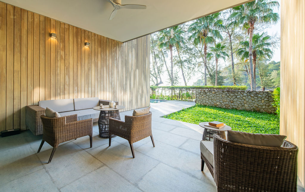 Covered outdoor lounge with rattan seating