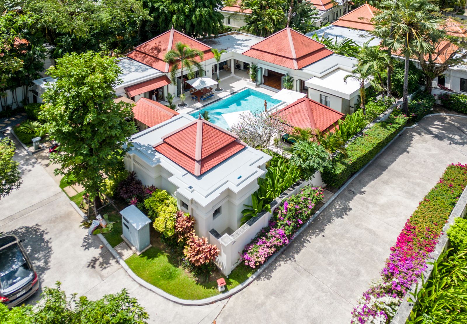 Aerial view of villa compound with pool