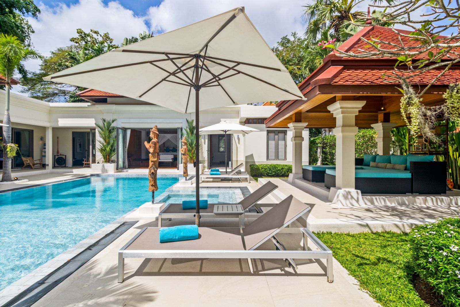 Pool terrace with loungers and sala pavilion