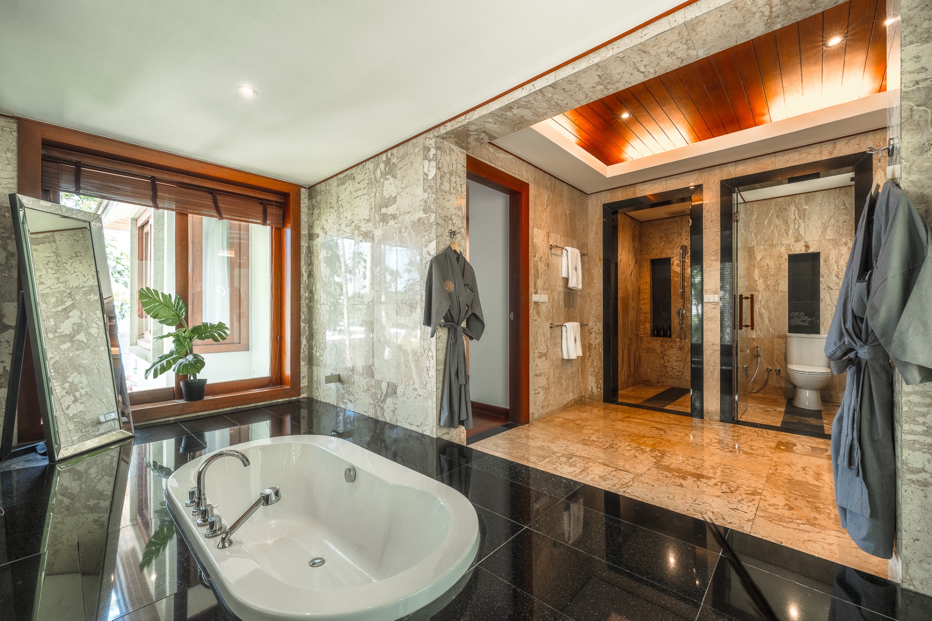 Luxury bathroom with soaking tub and rain shower