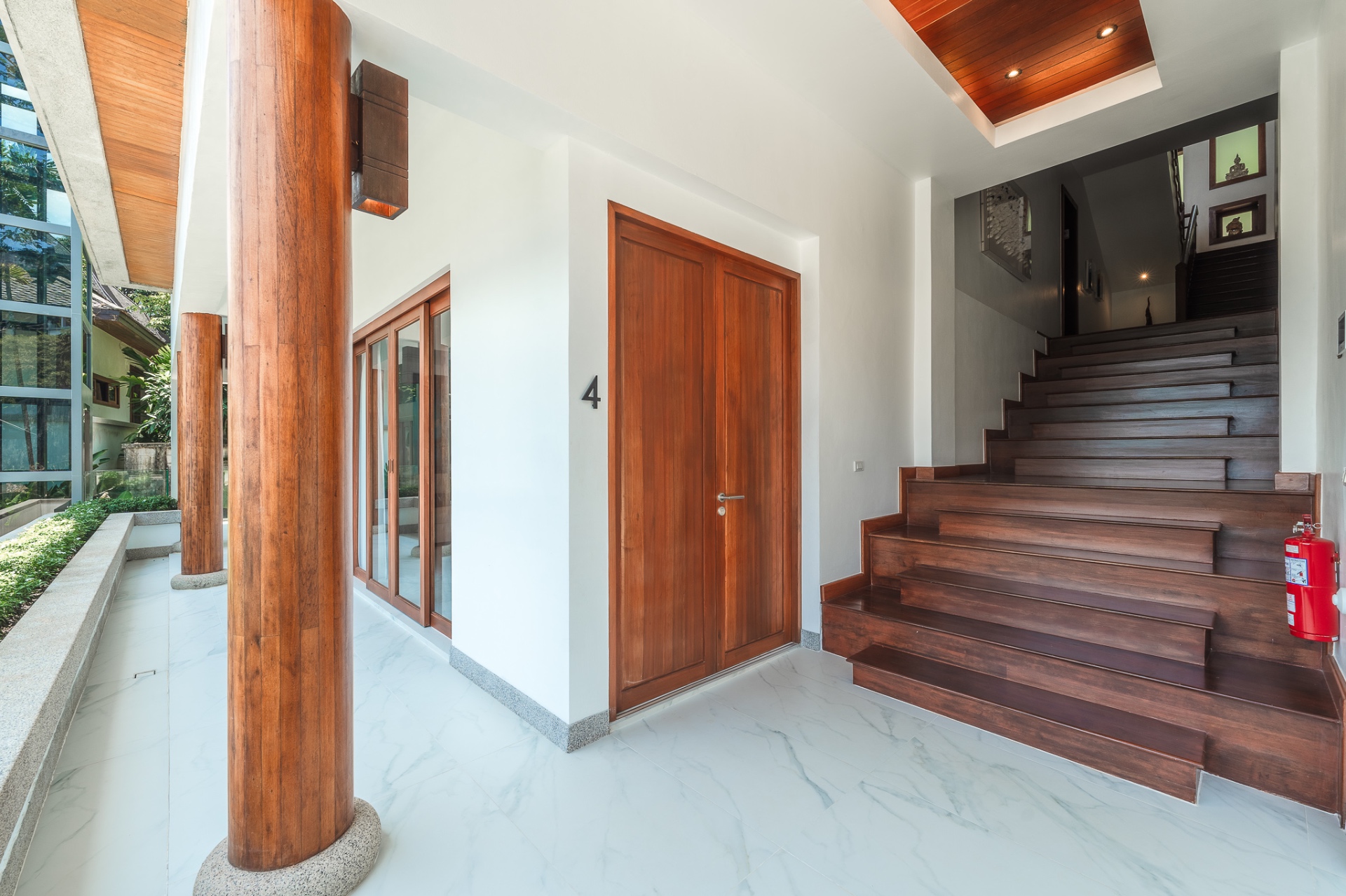 Grand entrance with teak columns