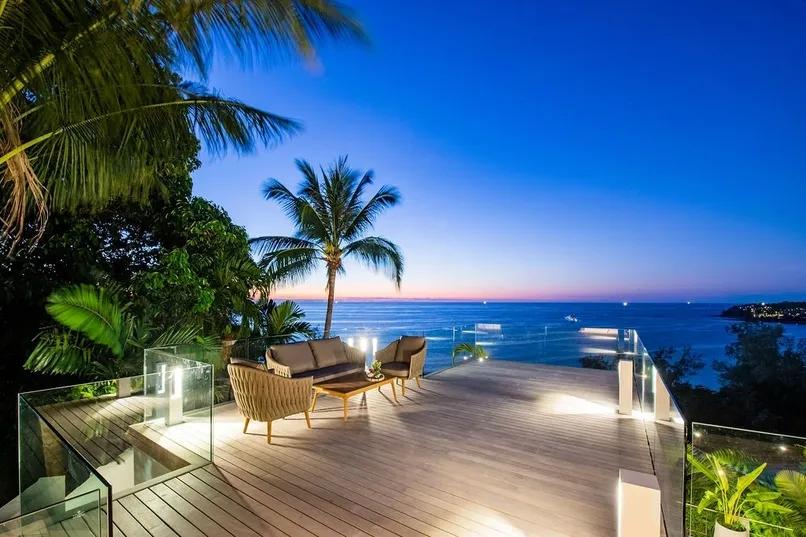 Terrace lounge at sunset with ocean panorama