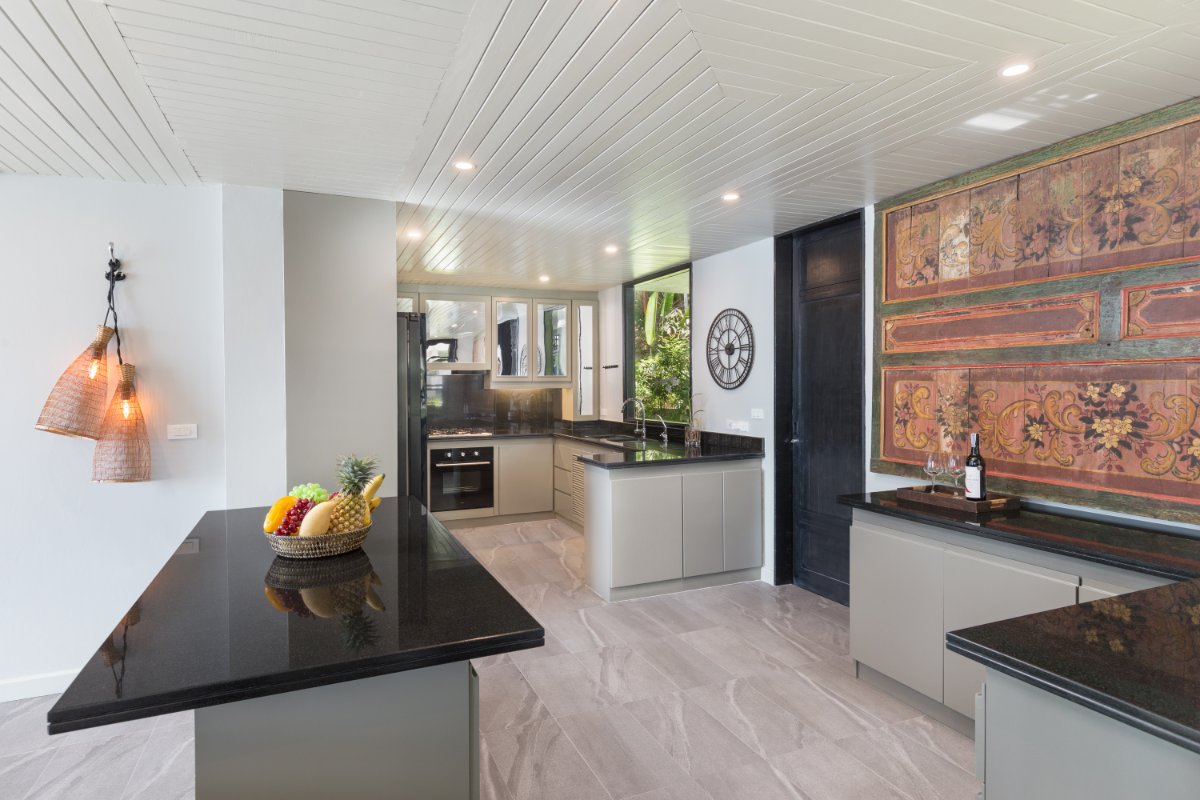 Kitchen island with Thai art decor at luxury Phuket villa
