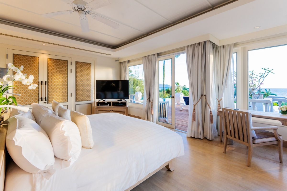Bedroom with ocean view and pool access